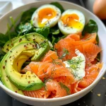 Close-up of a Keto Avocado and Smoked Salmon Breakfast Bowl with vibrant colors and textures.