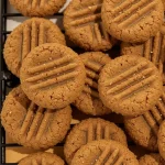 Close-up of healthy date cookies made from dates, oats, and nut butter, with a warm, inviting ambiance.