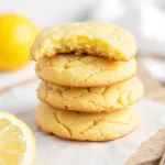 Close-up image of moist lemon cookies on a plate, showcasing a delicious texture.