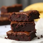Close-up view of 3-ingredient brownies made with bananas, showcasing a rich, fudgy texture.