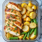 Close-up of a Lemon Garlic Chicken Meal Prep with vibrant broccoli and brown rice.