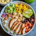 A close-up of a colorful Low-Calorie Chicken Burrito Bowl with vibrant ingredients.
