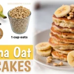 Close-up of healthy banana oatmeal pancakes stacked with a golden-brown color and a hint of syrup drizzle.