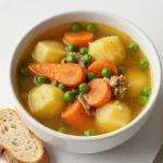 A hearty crockpot chicken stew filled with vegetables and herbs