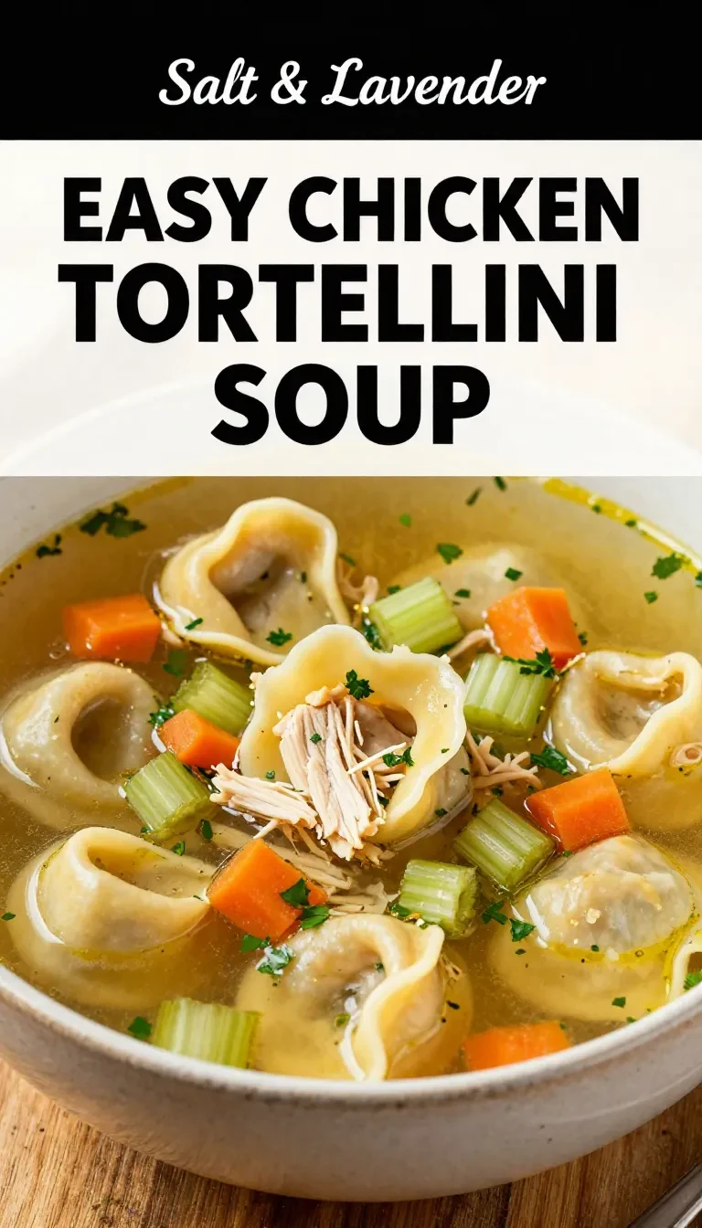 A steaming bowl of chicken tortellini soup garnished with fresh parsley