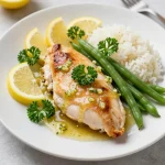 A delicious slow cooker lemon chicken dish garnished with fresh herbs